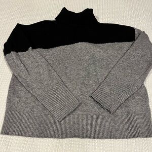 Black and gray Anthropologie turtleneck sweater. Cozy!